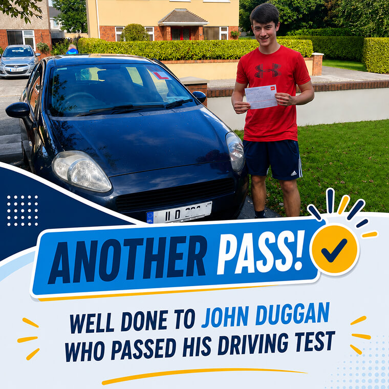 John Duggan celebrating his driving test pass with Drive with Clive