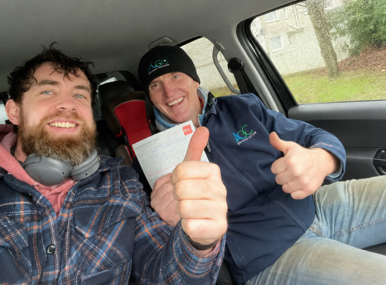 Learner and Drive with Clive instructor celebrating a driving test pass with ...