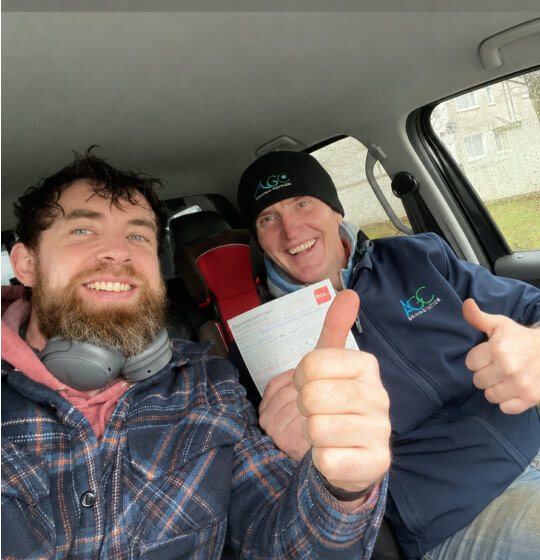Learner and Drive with Clive instructor celebrating a driving test pass with ...
