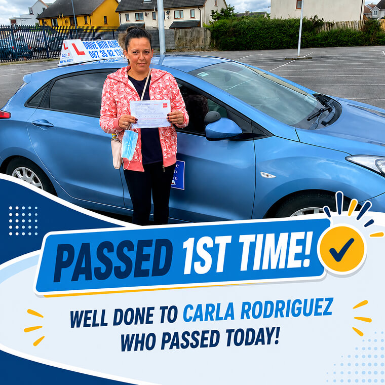 Carla Rodriguez celebrating her driving test pass with Drive with Clive